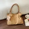 Bolso tote de cuero suave con diseño único para mujer, nuevo bolso de otoño 2026 de gran capacidad para el hombro para el trabajo y los desplazamientos, bolso de hombro