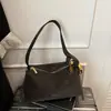 Bolso de Mano de Nicho Elegante Nuevo Invierno 2025 Bolso Cruzado de Cuero Suave Retro Bolso de Hombro Minimalista Chic de Moda