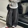 Ropa infantil estilo coreano 2026 colección otoño: conjunto de top a rayas con capucha de dos piezas de imitación y pantalones elegantes de pierna ancha para niñas