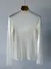 [Textura de corteza] Suéter de cuello alto sin costuras, todo en uno, de punto fino de 48 gauge 100% lana texturizada para mujer, otoño 2026