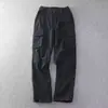 Pantalones cargo para hombre, negros, de pierna recta, corte holgado, multibolsillos, marca de moda, estilo coreano para primavera y otoño, pantalones casuales y versátiles para hombre