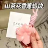 Pastillas de cera de camelia para uso doméstico en armarios de dormitorio, colgantes de fragancia de alta gama con un aroma natural y duradero