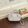 Bolsa de mão de moda estilo coreano 2026 nova bolsa feminina para o início do outono, alto valor estético, bolsa de ombro color-blocking com decoração de cinto, bolsa transversal