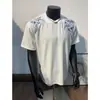Camiseta de hombre de manga corta bordada estilo chino, nuevo modelo verano 2026, top versátil de ajuste holgado de alta gama a la moda americana para hombre