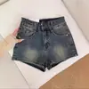 Shorts de Mezclilla Retro Americanos de Cintura Alta para Mujer Verano 2025 Nuevos Sexy Elásticos Efecto Adelgazante Línea A Súper Cortos Hot Pants Modernos