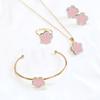 Collar y pulsera con colgante de cuatro piezas de flor de ciruelo de fritillaria negra de doble cara CDD, anillo y trébol de cuatro hojas, suministro de comercio exterior