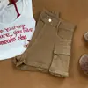 Diseño de correa moda callejera ropa de trabajo americana shorts mujer atuendo de moda adelgazante elegante versátil bolsillo de mezclilla
