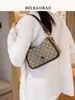 Fábrica de Origem da Bolsa do Norte Moda Nova 2025 Bolsa de Lona com Alça de Ombro e Axila de Urso Moda de Rua Transversal Bolsa Feminina