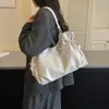 Bolso de hombro moderno para mujer, nueva colección 2026, lujo ligero, diseño de nicho, sensación de alta gama, versátil para el trabajo y el uso diario, bolso tote