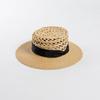 Moda casual nova de primavera e verão laço de fita tecelagem manual costura vazada grama de ráfia chapéu de palha chapéu de sol chapéu de palha tendência