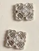 Nuevos colgantes de joyería estilo chino, accesorios de cobre fundido, accesorios para el cabello DIY, collares, piezas de colgante de flor con patrón de nube hueca tradicional