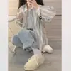 Chaqueta de camisa casual a rayas estilo francés para mujer, nuevo modelo principios de otoño 2026, top de manga larga de verano con protección solar