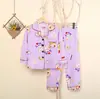 Pijama infantil de primavera e outono meninos e meninas manga longa desenho animado feminino infantil grande roupas de casa conjunto com lapela fabricantes atacado