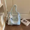 Bolsa de ombro lisa de moda 2026 transfronteiriça, bolsa tote de nicho de grande capacidade, bolsa de mão única e estilosa, bolsa da moda