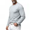 Ropa de hombre transfronteriza, camiseta básica de manga larga con cuello redondo para primavera y otoño, camiseta básica versátil de color liso ajustada, top casual para hombre