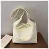 2026 Nueva Bolsa para Mujer Estilo Coreano y Japonés Bolso de Hombro de Encaje con Lazo Gran Capacidad Alto Valor Bolsa de Lona Estudiante Hada