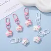 Lindo personaje de dibujos animados estrella gato KT moño llavero accesorio DIY amuleto para bolsa cadena de teléfono móvil llavero de cuentas colgante