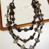 Collar de Múltiples Capas con Botones de Dopamina Estilo Étnico Cadena Larga para Suéter con Colgante de Coco y Madera Estilo Literario Retro para Mujer