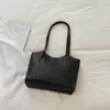 Bolsa de tecido com padrão de trama de grande capacidade, novo modelo de verão 2026, visual estiloso e descontraído, adequada para a faculdade e para o dia a dia