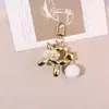 Novo Pingente Chaveiro Cachorro Pérola Galvanizada Carro Cachorro Bolha Pingente Bolsa Capa Fone de Ouvido Chaveiro Presente