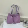 Bolso de mano tejido súper popular para mujer 2026 Nueva moda Bolso de hombro versátil de gran capacidad para el trabajo de verano