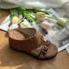 Sandalias de Verano 2026 Estilo Nuevo Bohemio Retro Moda Aumentadoras de Altura Hebilla de Borla Pantuflas con Estampado de Leopardo
