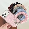 Correa de muñeca nueva original para otoño/invierno con un patrón de estrella de jacquard, diseño trenzado hecho a mano, doble hebilla y cadena anti-pérdida para teléfono