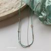 Cadena de clavícula con cuentas de arroz de piedra natural de doble capa apiladas, estilo chino, nuevo, relleno de primavera, temperamento de estilo frío.