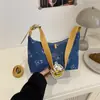 Bolso Casual y Versátil de un Solo Hombro para Axila para Mujer Tendencia Primavera 2025 Ropa de Trabajo Moda Bolso de Denim tipo Dumpling