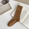 Calcetines de punto sin costuras estilo coreano para mujer a principios de otoño, calcetines simples de algodón con encaje hueco estilo JK y borde de burbuja, calcetines holgados de color liso
