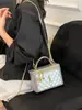 Bolsa de mão estilo Chanel 2026 novo modelo padrão diamante corrente de bolinhas douradas bolsa para mulheres versátil transversal mini bolsa de maquiagem