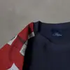 Camiseta de manga larga raglán de punto gofre con un estampado desgastado estilo vintage de la bandera noruega en un lado, camiseta base texturizada de cuello redondo retro