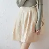 Nueva falda corta de punto de lana pura para otoño e invierno para mujer, color liso, adelgazante, de cintura alta, línea A