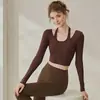 Ropa de yoga para mujer, colección otoño/invierno, camiseta deportiva transpirable con sujetador incorporado, corte ajustado, estilo de dos piezas, manga larga y diseñada para actividades de fitness