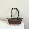 Bolso tote de estilo francés con nicho y asa larga, nuevo diseño de moda, bolso baguette de alta calidad, moderno y versátil, perfecto para llevar debajo del brazo