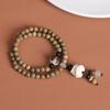 Pulseira de Sândalo Verde Contas de Buda Contas Cilindricas Duplas de Sândalo Pulseira de Bambu Círculo Duplo Estilo Antigo Pingente de Brinquedo Masculino e Feminino Atacado