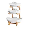 Plato de frutas creativo de doble capa multicapa estilo europeo de cerámica para frutas secas con soporte de bambú plato de sushi para el hogar cesta de frutas directo de fábrica