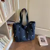 Bolso tote simple de gran capacidad, nuevo bolso tote casual de lona de color liso, estilo moderno, bolso de hombro para el trabajo, principios de otoño 2026
