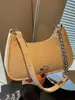 Bolsa de ombro Shuai Mi Jia nicho retrô texturizada 2026 verão nova simples bolsa baguette corrente de ombro pequena quadrada