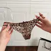 Moderno y salvaje~ Nueva tanga sexy de estampado de leopardo, pura y caliente, con una vibra apasionada, bragas de triángulo de malla transpirable y finas