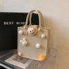 Bolsa de fieltro nueva de internet directa de fábrica caricatura bebé banquete de cien días niños muñeca linda regalo de mano bolso
