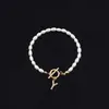 2025 Moda Nueva Transfronteriza Pulsera de Letras Inglesas Cobre Incrustado Circonita Oval Perla de Imitación Pulsera de Perlas al por Mayor