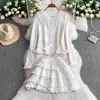 Cárdigan de manga larga estilo coreano para mujer con ribete de encaje y falda de capas, conjunto de punto extremadamente elegante para principios de otoño