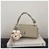 Bolsa de Mão Feminina Elegante e Fresca, Bolsa de Ombro e Transversal Moderna e Versátil, Nova Bolsa de Commuter Estilo Coreano de Nicho 2026