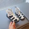 Sandalias para Niñas 2026 Verano Nuevos Zapatos para Niños Zapatos de Princesa para Niña Pequeña Suela Suave Punta Cerrada Zapatos Romanos para Niños Mayores