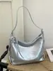 Bolso pequeño súper popular para mujer, nuevo bolso de hombro de moda y elegante primavera-verano 2026, bolso cruzado tipo cubo versátil