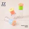 Servicio de Pedidos Jinze: Tapa Redonda en Forma de Flor, 4 Tipos de Botellas Disponibles, Se Puede Colgar con una Cadena, Tubo para Brillo de Labios, Material de Empaque de Plástico