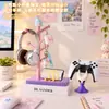 Linda Persona Pequeña de Dos Ojos Rama con Forma de Exhibidor de Almacenamiento Soporte para Auriculares Escritorio E-sports Exhibidor de Almacenamiento Decoración