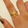 Anillo ajustable con apertura de estrella de mar oceánica para mujer, joyería de acero inoxidable transfronteriza entre Europa y Estados Unidos, venta al por mayor