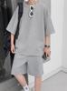Traje deportivo y de ocio para niños con un conjunto de hermosa camiseta de manga corta de marca de moda ins verano pesado waffle moda